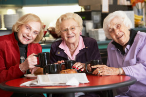 Senior women drinking tea together